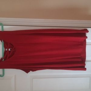 Red, loose sleeveless top